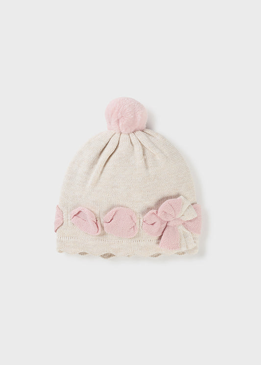 Cappello nascita in tricot con pon pon